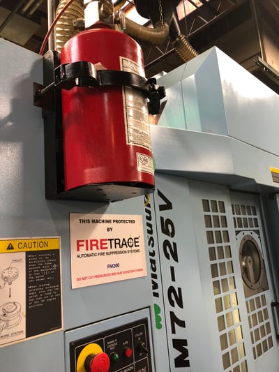 CNC Grinder - This Machine Protected by Firetrace